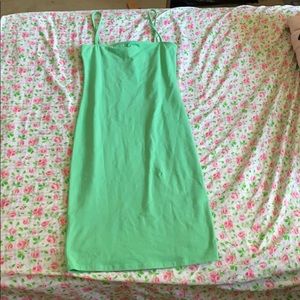 A green down to knee dress